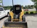2007 John Deere 325 Image