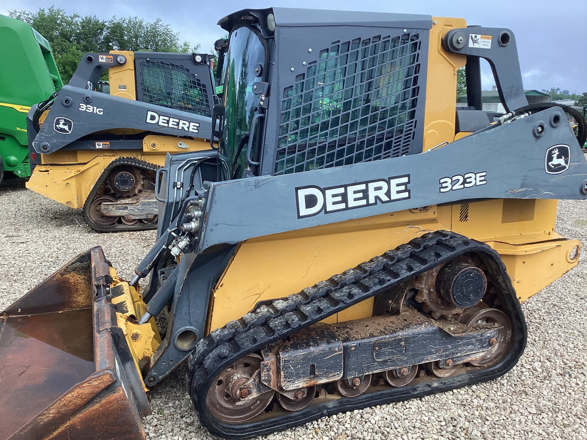2013 John Deere 323E Image