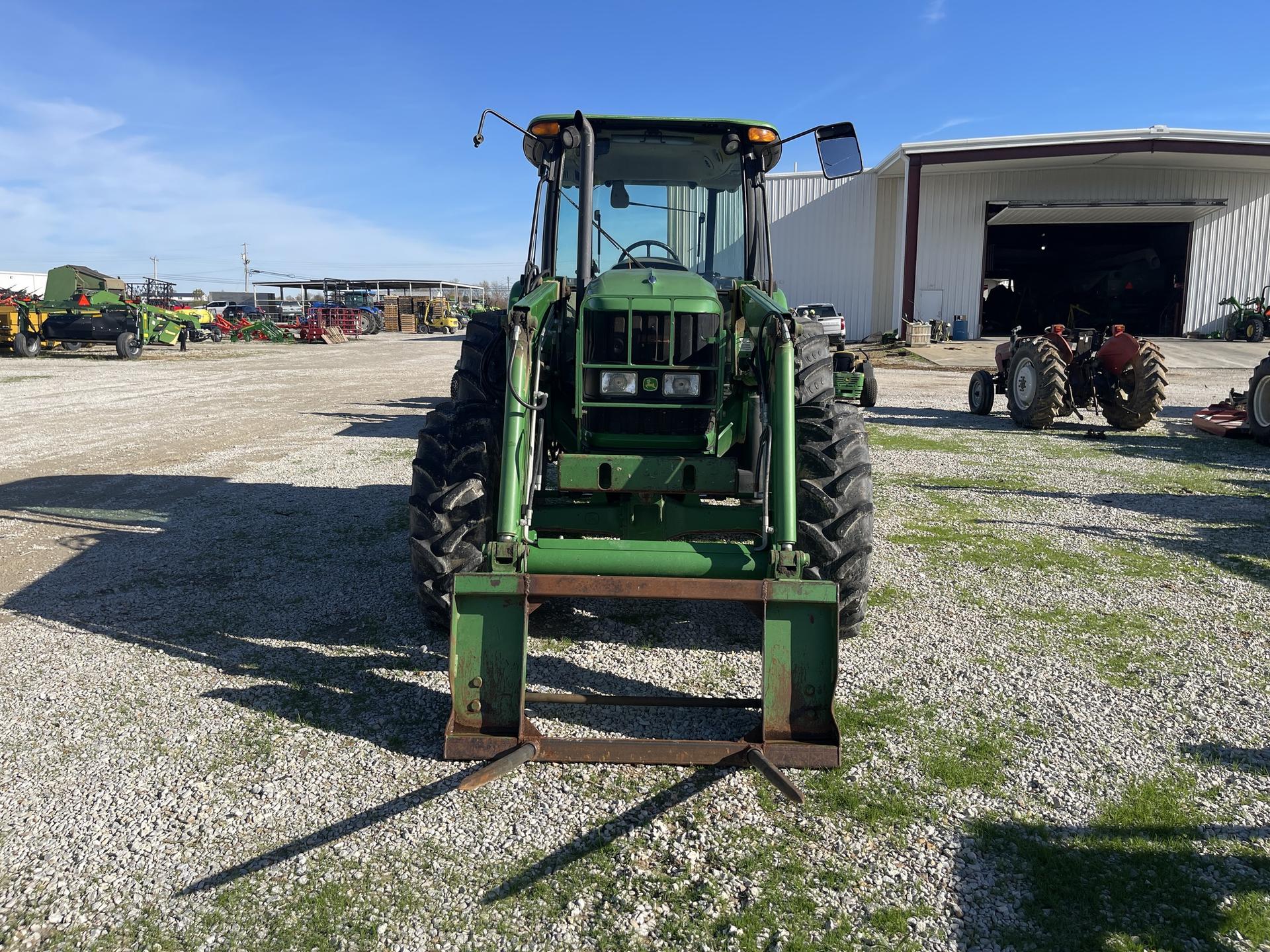 2009 John Deere 6115D Image