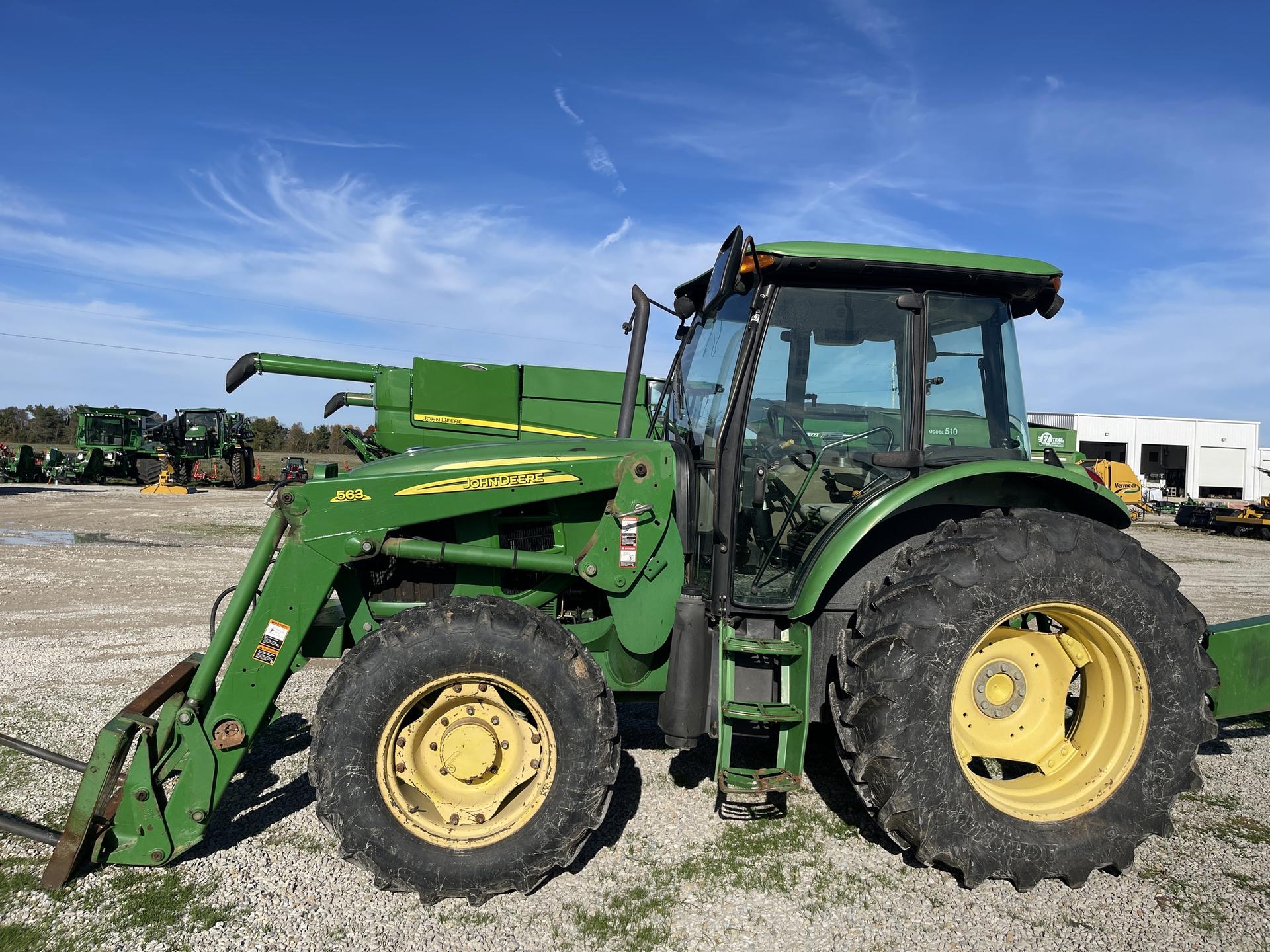 2009 John Deere 6115D Image