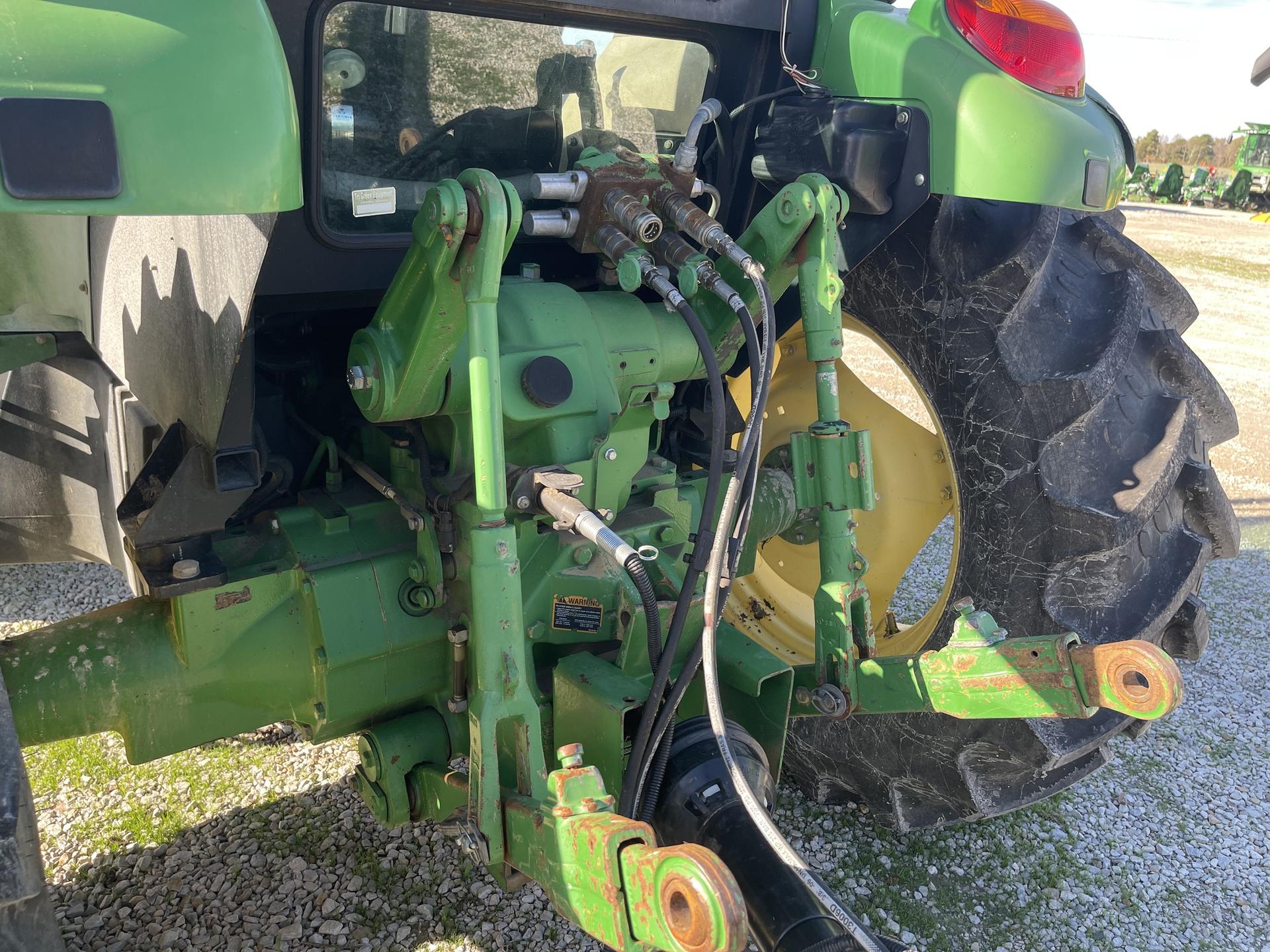 2009 John Deere 6115D Image