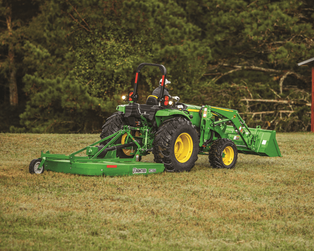 John Deere rotary cutter mowing