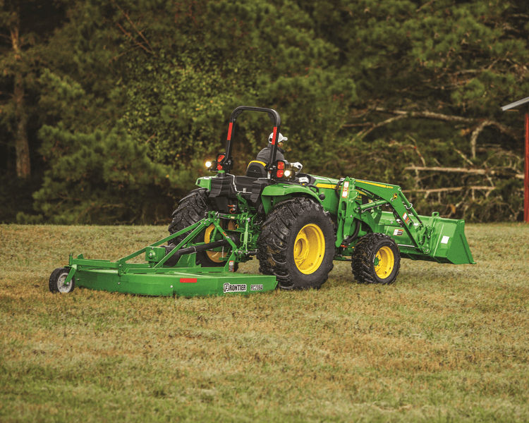 John Deere rotary cutter mowing